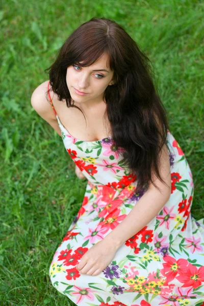 Portrait of tired young girl relaxing in spring park — Stock Photo, Image
