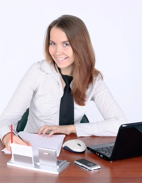Attentive businesswoman signing document — Stock Photo, Image