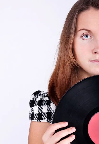 Flickan med en vinylskiva — Stockfoto