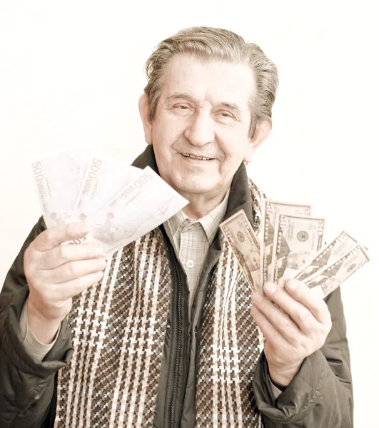 Homme heureux âgé avec un paquet d'argent — Photo