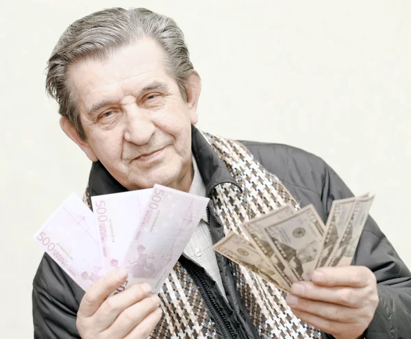 快乐老人的钱的包 — 图库照片