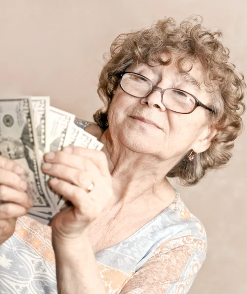 Senior happy woman with money — Stock Photo, Image
