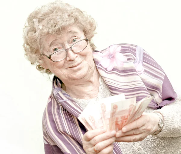 金のパックで高齢者の幸せな女 — ストック写真