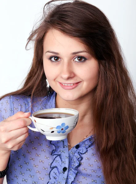Beautiful brunette lady drinking bracing coffee — Stock Photo, Image