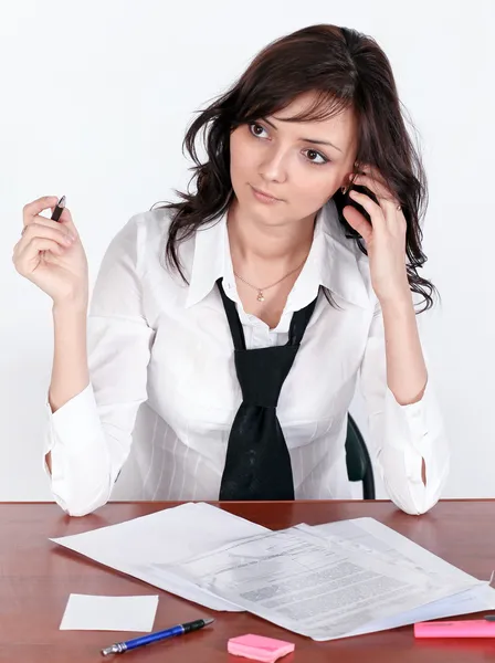 Beautiful brunette lady dreaming at work — Stock Photo, Image