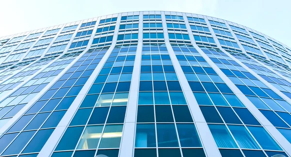 Panoramic transparent glass wall of office building — Stockfoto