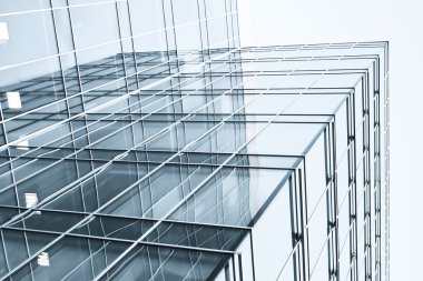 Transparent glass wall with blank placard of skyscraper