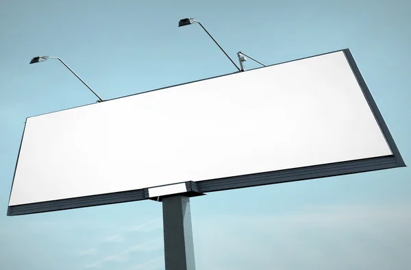 Blank big billboard over blue cloudy sky — Stock Photo, Image