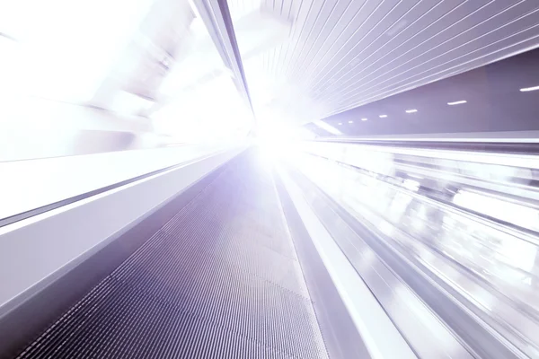 Violet light escalator way — Stock Photo, Image