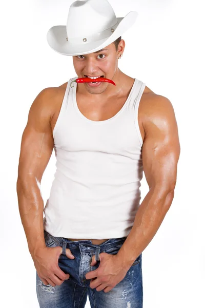 Lachende sexy jongen in hoed — Stockfoto