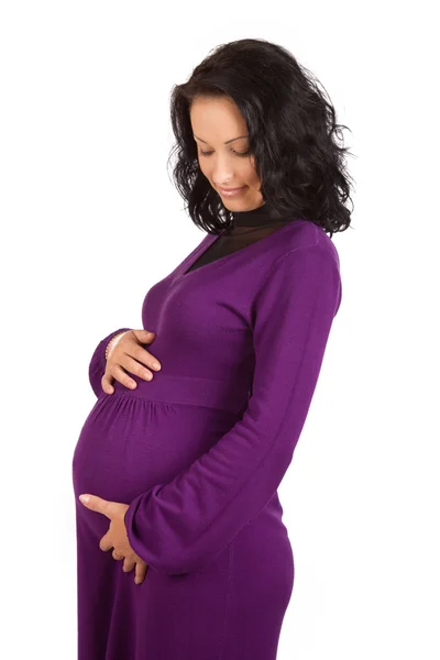 Zwangere vrouw op zoek naar buik — Stockfoto