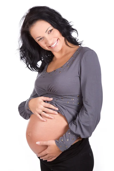 Usmívající se žena s velkým břichem — Stock fotografie