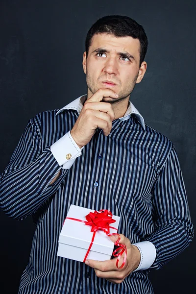 Portrait of happy male with christmass gifts — Stock Photo, Image