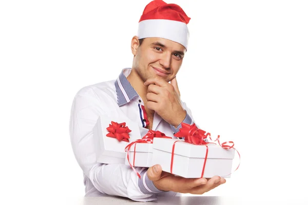 Imagen de atractivo macho con regalos de Navidad — Foto de Stock
