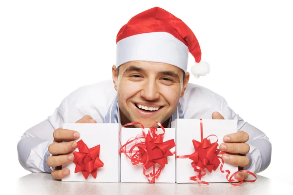 Młody człowiek z Boże Narodzenie prezenty — Zdjęcie stockowe