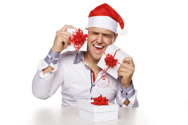 Giovane uomo con regali di Natale — Foto Stock