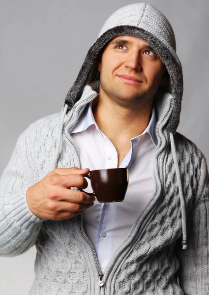 Homem bonito com xícara de café — Fotografia de Stock