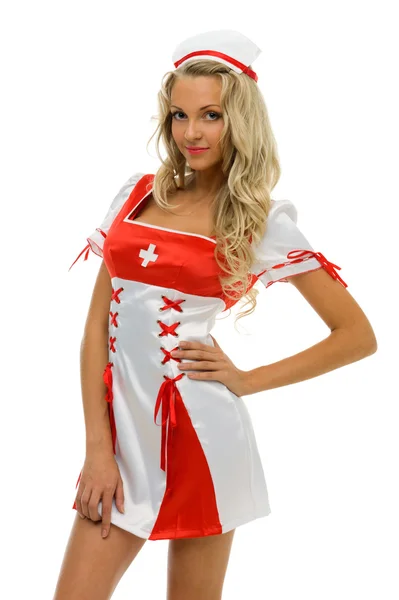 Hermosa mujer disfrazada de carnaval. Forma de enfermera — Foto de Stock