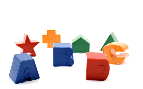 Toy figures and letters — Stock Photo, Image