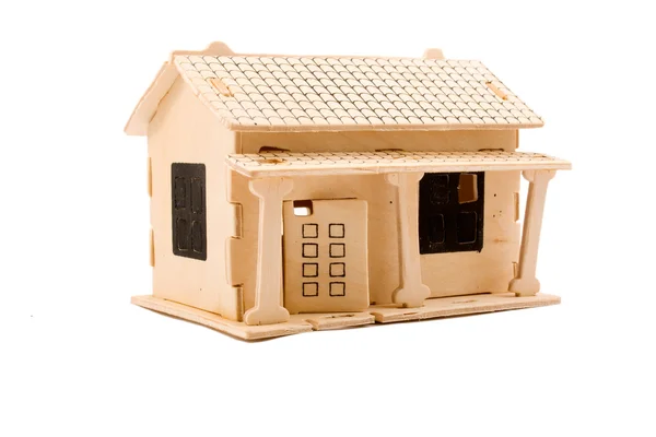 Dřevěný dům hraček izolovaných na bílém pozadí — Stock fotografie