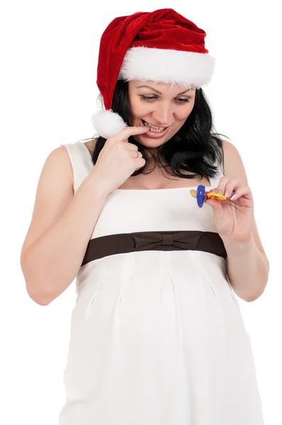 Zwangere vrouw in Kerstman hoed — Stockfoto