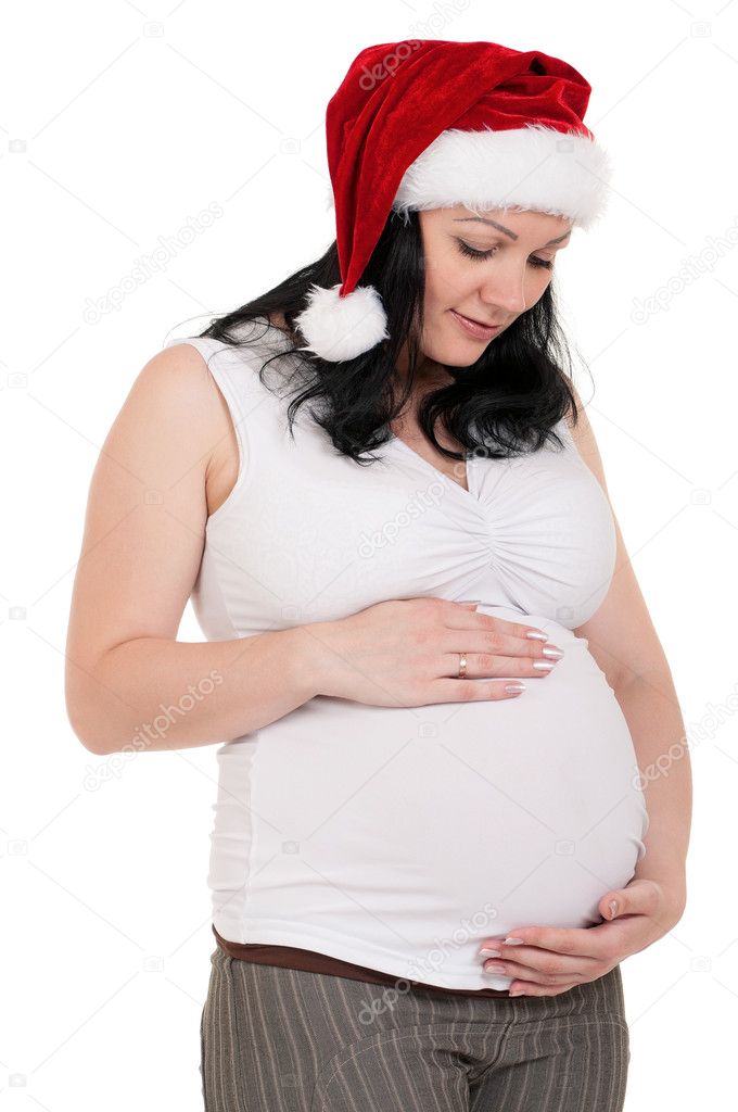 Pregnant woman in santa hat