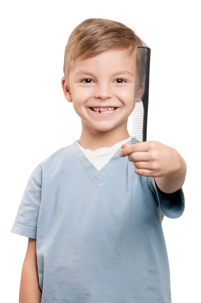 Chlapec s hřebenem — Stock fotografie