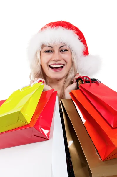 Kerstmis vrouw met shopping tassen — Stockfoto