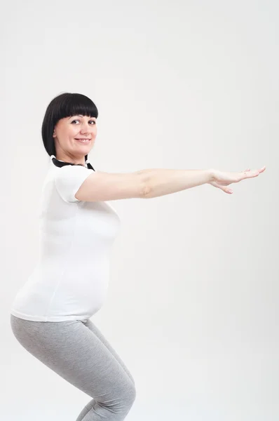 Fitness těhotná žena — Stock fotografie