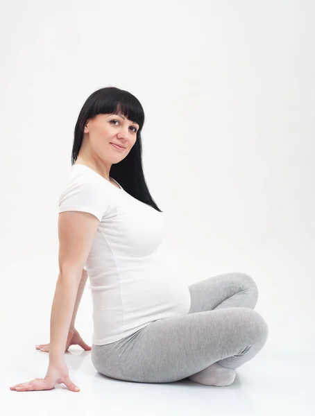 妊娠中のフィットネス女性 — ストック写真