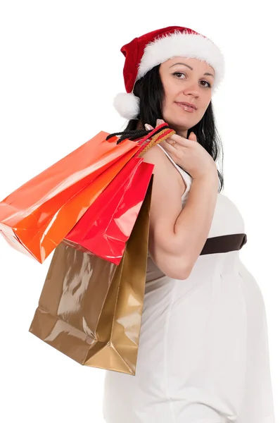 Mulher grávida com sacos de compras — Fotografia de Stock