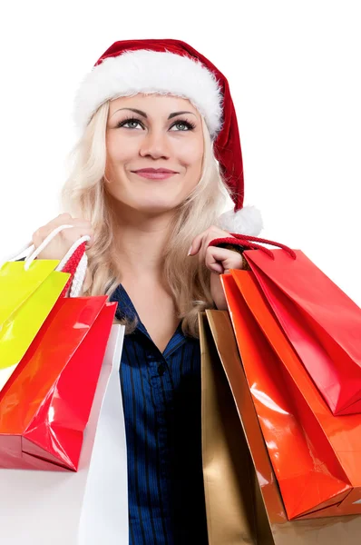 Mulher de Natal com sacos de compras — Fotografia de Stock