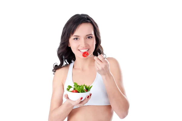 Young girl eating fresh salad — Stock Photo, Image