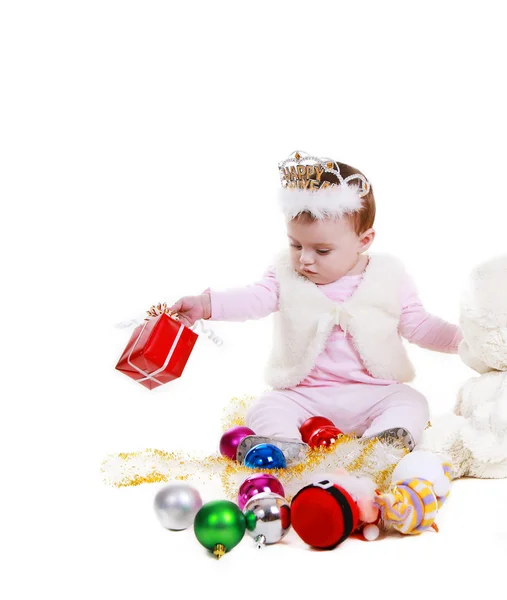 Bambina con decorazioni natalizie — Foto Stock