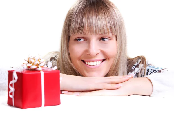 Beautiful young woman and a gift — Stock Photo, Image