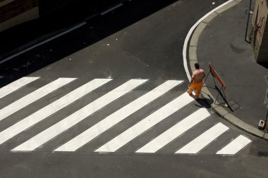 Worker on the pedestrian crossing