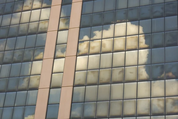 Clouds on Mirror surface of a building — Stok fotoğraf