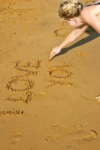 Писать, что я люблю тебя на пляже — стоковое фото