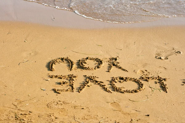 Writing i love you on the beach — Stockfoto