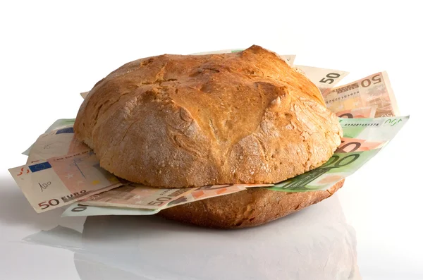 Bread with bills — Zdjęcie stockowe
