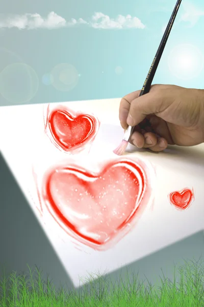 Hand painting hearts — Stock Photo, Image