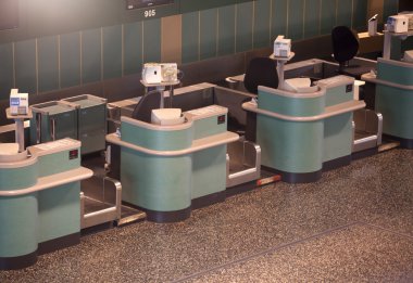 Desks in airport hall clipart