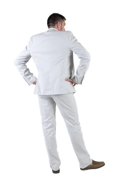 Businessman looks ahead. rear view. Isolated over white . — Stock Photo, Image