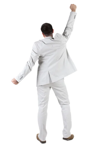 Businessman thumbs up. rear view. Stock Photo