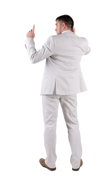 白いスーツを着た思考若いビジネス男の背面図. — ストック写真