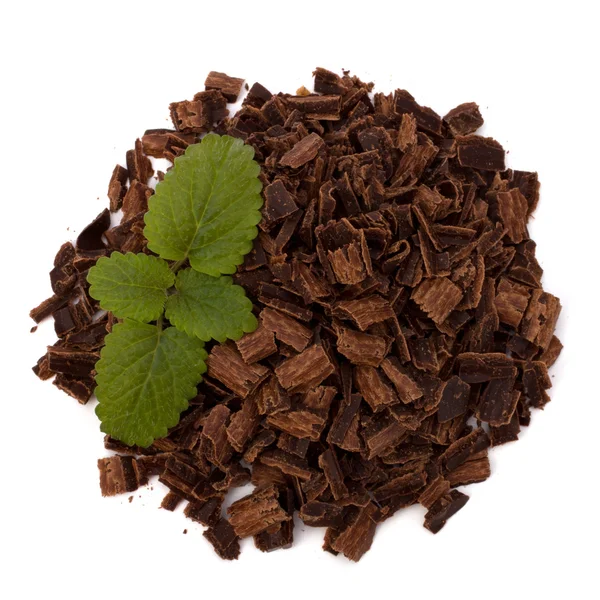 Crushed chocolate shavings pile and mint leaf — Stock Photo, Image