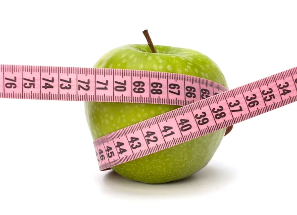Jabłko z centymetrem. pojęcie zdrowego stylu życia. — Zdjęcie stockowe