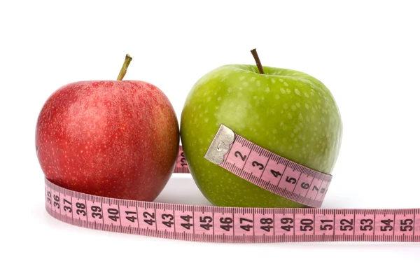 Manzana con cinta métrica. concepto de estilo de vida saludable . — Foto de Stock