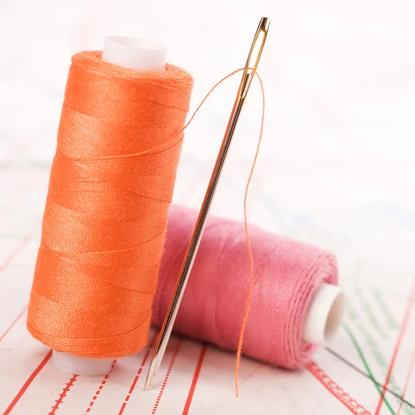 stock image Spool of thread and needle. Sew accessories.