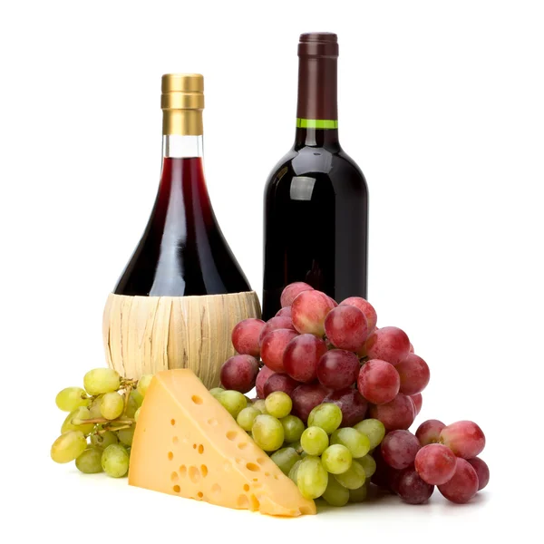 Full röda vinflaskor — Stockfoto